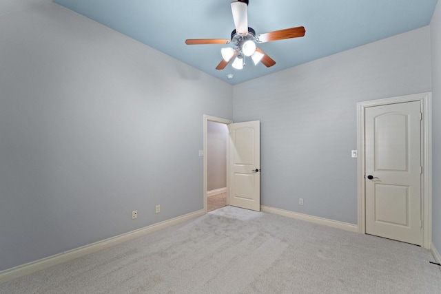 19403 Shady Edge Dr, Cypress, TX 77433 - unfurnished bedroom featuring carpet, baseboards, and a ceiling fan