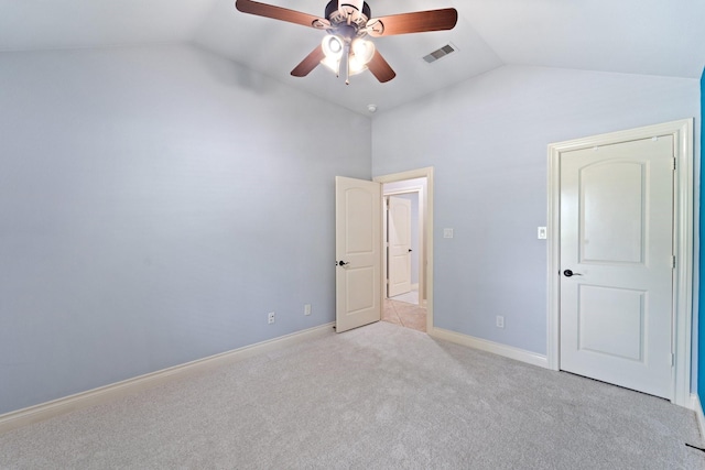 19403 Shady Edge Dr, Cypress, TX 77433 - unfurnished bedroom with lofted ceiling, light colored carpet, a ceiling fan, and baseboards