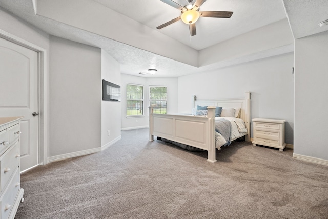 402 Eastwood Dr, Woodbranch, TX 77357 - carpeted bedroom with baseboards and ceiling fan