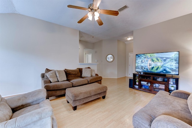 8123 Sweetgum Trace Dr, Houston, TX 77040 - living room with vaulted ceiling, light wood-style floors, and ceiling fan
