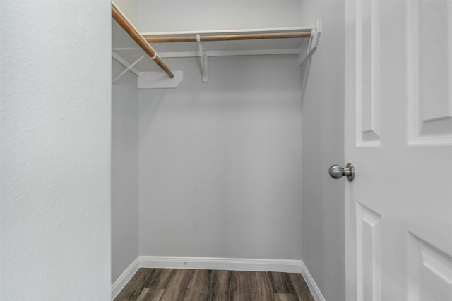 6902 White Ash Ln, Baytown, TX 77521 - walk in closet featuring dark wood finished floors