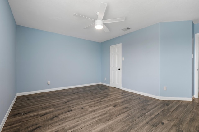 6902 White Ash Ln, Baytown, TX 77521 - empty room featuring dark wood finished floors, baseboards, and a ceiling fan