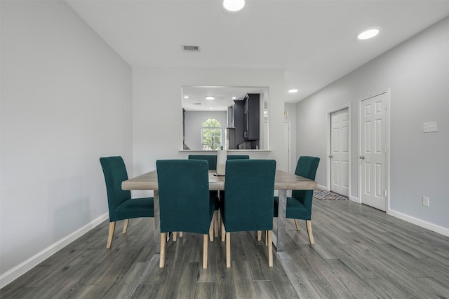 6902 White Ash Ln, Baytown, TX 77521 - dining space featuring wood finished floors, baseboards, and recessed lighting