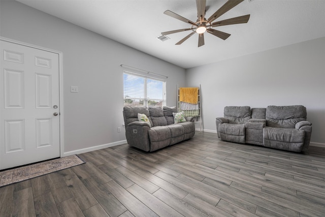 6902 White Ash Ln, Baytown, TX 77521 - living area featuring a ceiling fan, wood finished floors, and baseboards