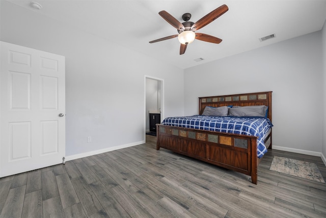 6902 White Ash Ln, Baytown, TX 77521 - bedroom with wood finished floors, baseboards, and ceiling fan