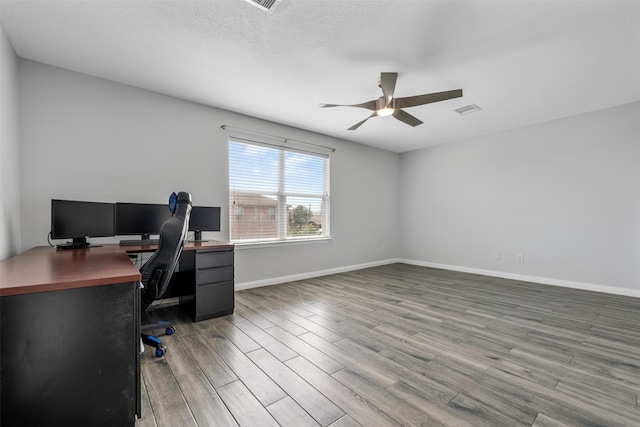 6902 White Ash Ln, Baytown, TX 77521 - office featuring a ceiling fan, wood finished floors, and baseboards