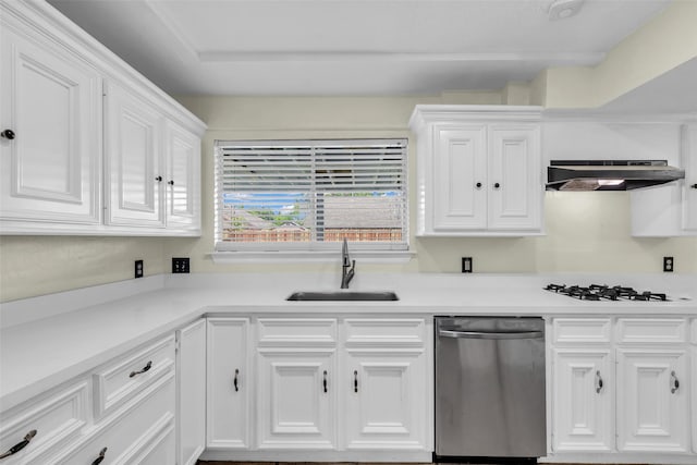 15830 Pipers View Dr, Houston, TX 77598 - kitchen featuring stainless steel dishwasher, exhaust hood, a sink, white gas stovetop, and white cabinets