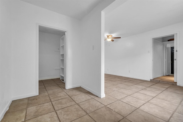 15830 Pipers View Dr, Houston, TX 77598 - unfurnished room with ceiling fan, light tile patterned floors, and baseboards