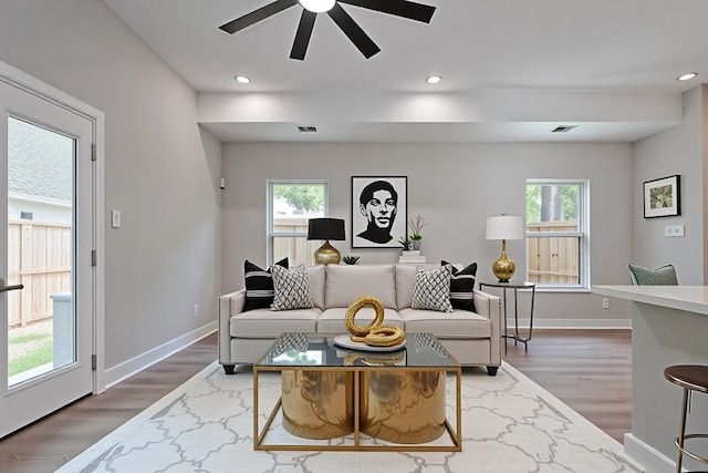 7911 Carver Rd, Houston, TX 77088 - living area featuring a ceiling fan, wood finished floors, baseboards, and recessed lighting