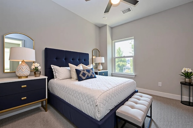 7911 Carver Rd, Houston, TX 77088 - carpeted bedroom with baseboards and ceiling fan