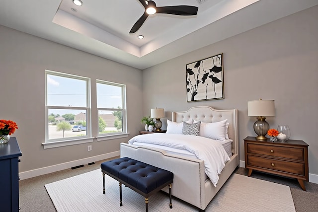 7911 Carver Rd, Houston, TX 77088 - bedroom featuring carpet floors, baseboards, recessed lighting, a tray ceiling, and ceiling fan