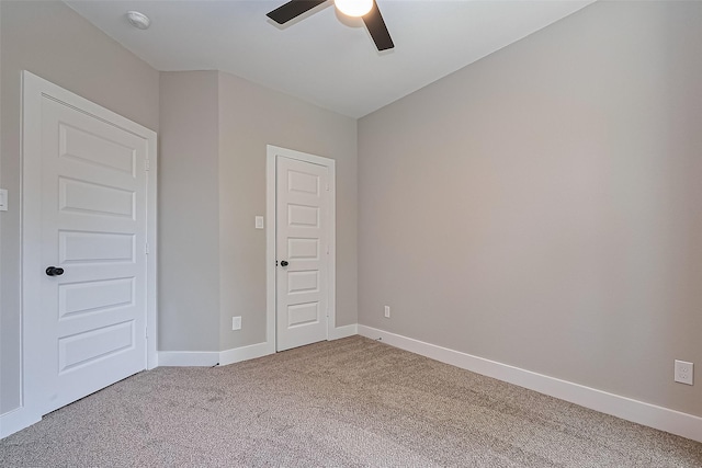 7911 Carver Rd, Houston, TX 77088 - unfurnished bedroom with carpet, baseboards, and a ceiling fan