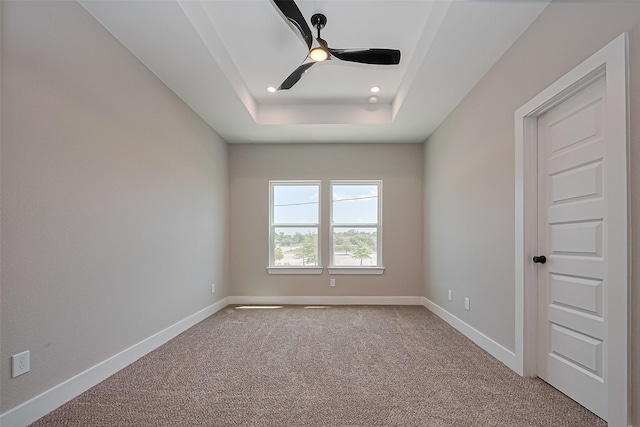 7911 Carver Rd, Houston, TX 77088 - carpeted empty room featuring a tray ceiling, baseboards, ceiling fan, and recessed lighting