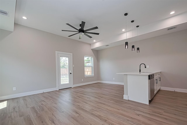 7911 Carver Rd, Houston, TX 77088 - unfurnished living room with a sink, light wood finished floors, a ceiling fan, recessed lighting, and baseboards