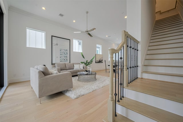 1205 Timbergrove Acres St, Houston, TX 77008 - living room featuring ornamental molding, a ceiling fan, stairway, light wood finished floors, and recessed lighting