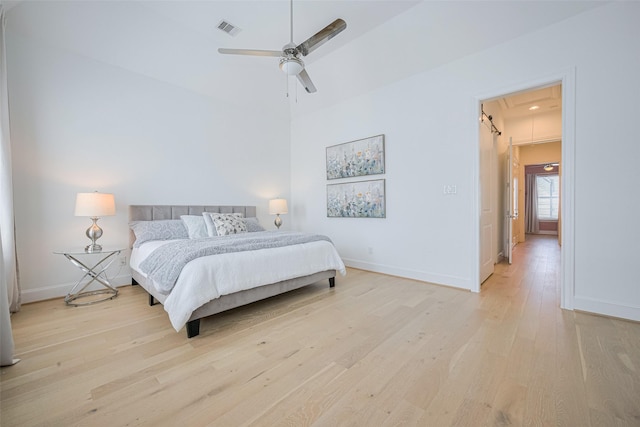 1205 Timbergrove Acres St, Houston, TX 77008 - bedroom with light wood-style floors, attic access, and ceiling fan