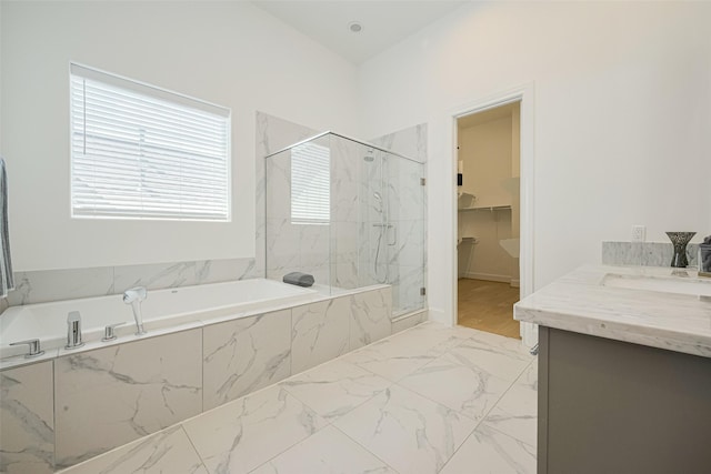1205 Timbergrove Acres St, Houston, TX 77008 - full bathroom with a marble finish shower, a bath, vanity, a walk in closet, and marble finish floors