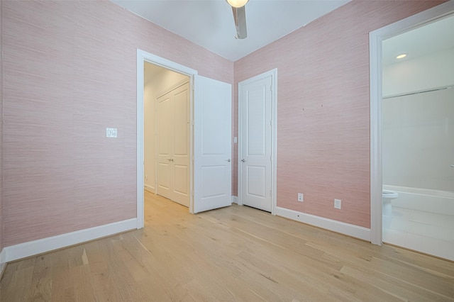 1205 Timbergrove Acres St, Houston, TX 77008 - unfurnished bedroom featuring light wood-type flooring, connected bathroom, and a ceiling fan