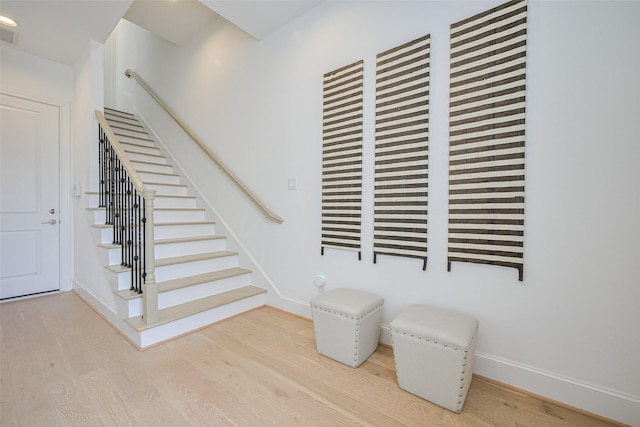 1205 Timbergrove Acres St, Houston, TX 77008 - stairway with wood finished floors and recessed lighting