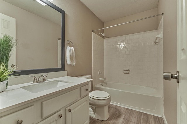 94 S Magnolia Pond Pl, The Woodlands, TX 77381 - full bath with wood finished floors, toilet, vanity, and  shower combination