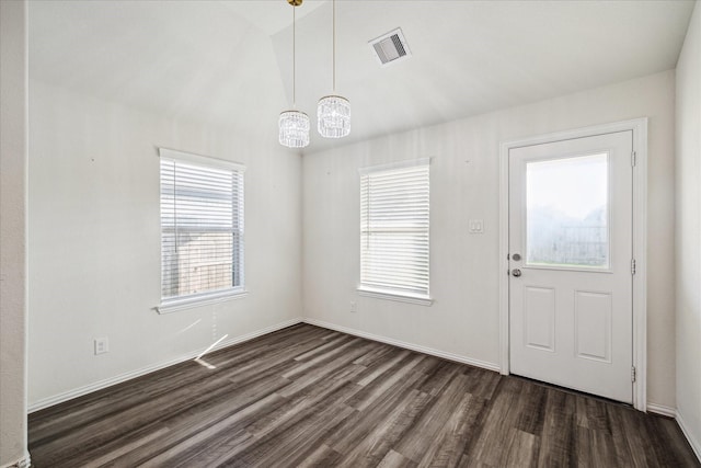 8931 Beacon Mill Dr, Cypress, TX 77433 - foyer featuring dark wood finished floors, a chandelier, and baseboards