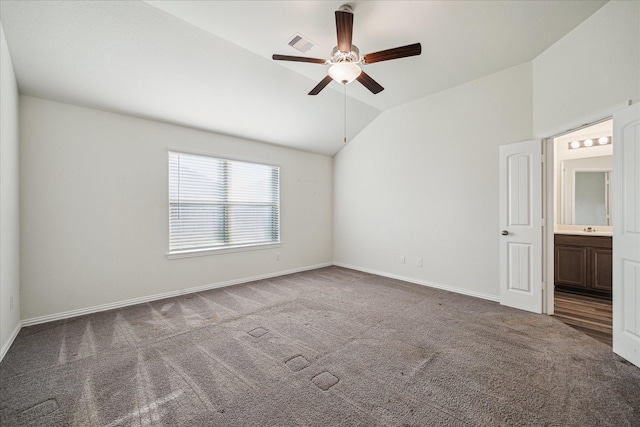 8931 Beacon Mill Dr, Cypress, TX 77433 - unfurnished bedroom featuring vaulted ceiling, carpet, baseboards, a ceiling fan, and a sink