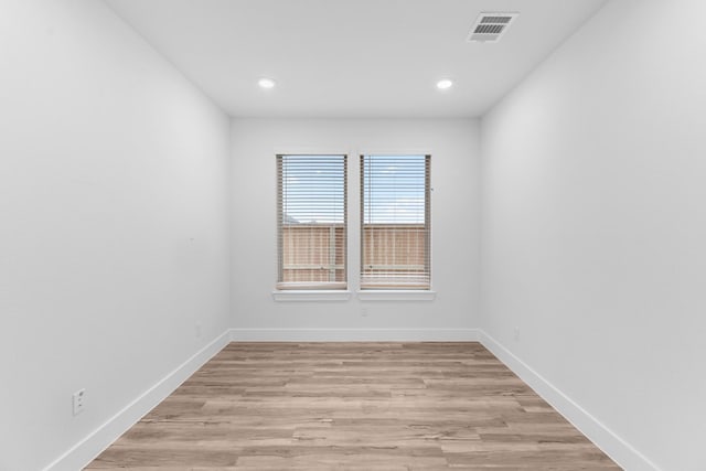19209 Olive Heath Ln, Magnolia, TX 77355 - spare room with baseboards, recessed lighting, and light wood-style flooring