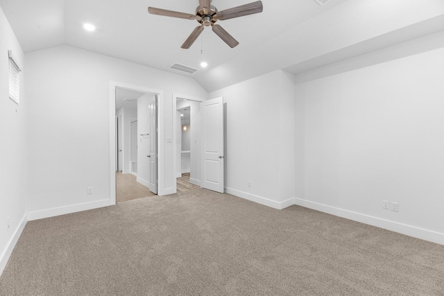 19209 Olive Heath Ln, Magnolia, TX 77355 - unfurnished bedroom with light colored carpet, lofted ceiling, recessed lighting, baseboards, and ensuite bath