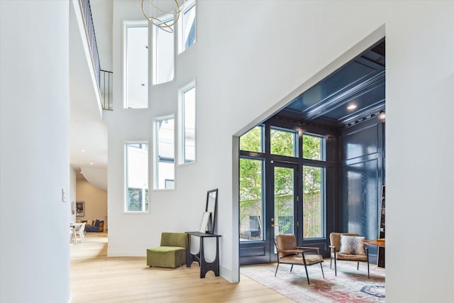 2013 Persa St, Houston, TX 77019 - foyer with a high ceiling, wood finished floors, and healthy amount of natural light