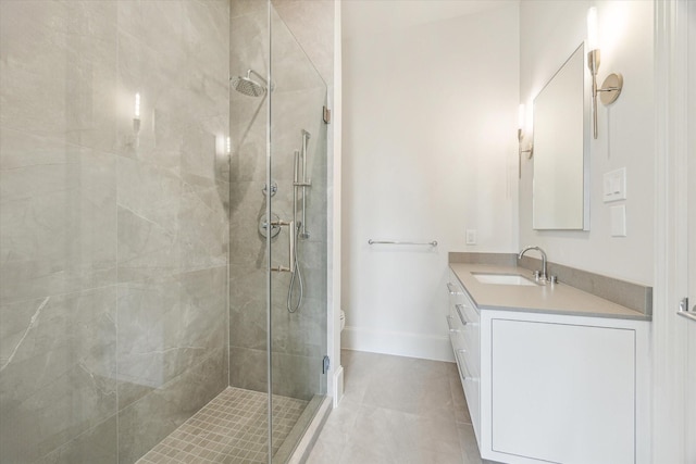 2013 Persa St, Houston, TX 77019 - bathroom with a shower stall, vanity, tile patterned flooring, toilet, and baseboards