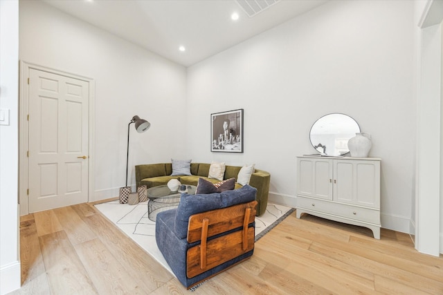2013 Persa St, Houston, TX 77019 - living room with light wood-style floors, recessed lighting, and baseboards
