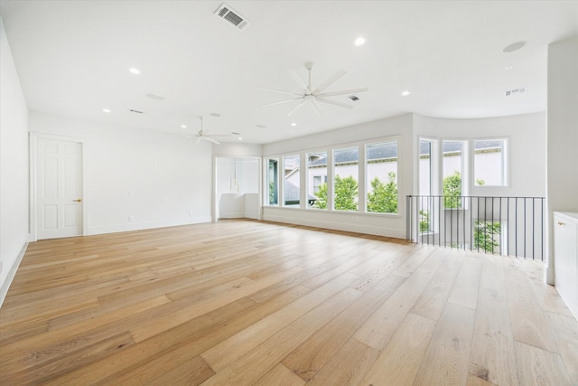 2013 Persa St, Houston, TX 77019 - empty room featuring light wood-style floors, ceiling fan, baseboards, and recessed lighting