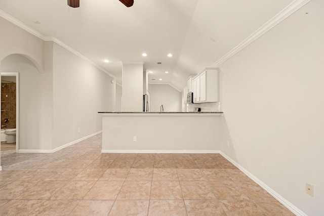 3522 Ember Falls Ln, Katy, TX 77449 - unfurnished room featuring a ceiling fan, ornamental molding, recessed lighting, lofted ceiling, and arched walkways
