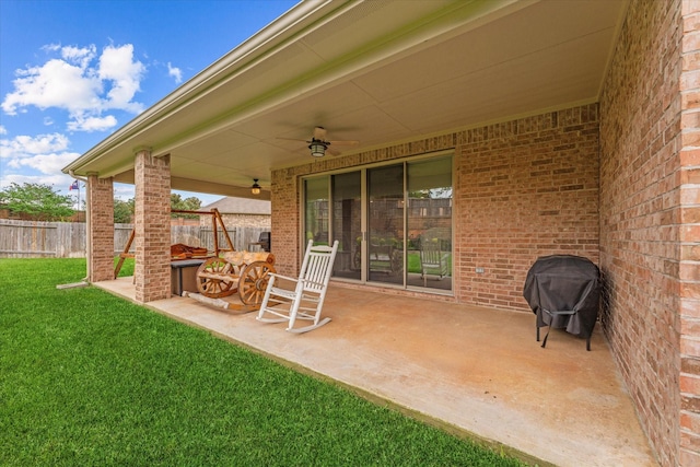 12103 Kaiso Ln, Conroe, TX 77304 - view of patio / terrace with a ceiling fan and a grill
