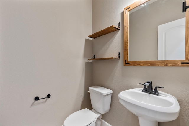 15002 House Martin Ln, Cypress, TX 77429 - bathroom with toilet and a sink