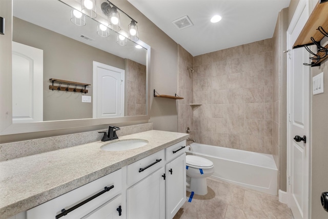 15002 House Martin Ln, Cypress, TX 77429 - bathroom with toilet, vanity, tub / shower combination, and tile patterned floors