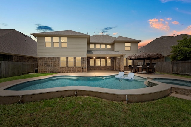15002 House Martin Ln, Cypress, TX 77429 - view of pool featuring a fenced backyard, a patio area, and a pool with connected hot tub