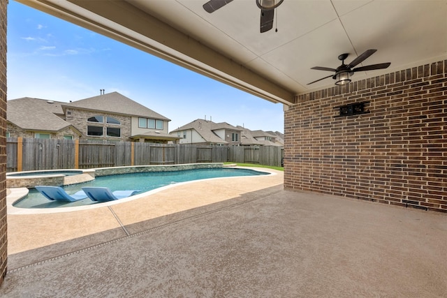 15002 House Martin Ln, Cypress, TX 77429 - view of pool featuring ceiling fan, a fenced backyard, a patio, and a pool with connected hot tub
