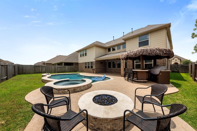 15002 House Martin Ln, Cypress, TX 77429 - view of pool featuring a patio, an outdoor fire pit, and a pool with connected hot tub