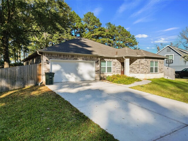 116 Augusta Dr, Huntsville, TX 77340 - single story home with brick siding, concrete driveway, an attached garage, and roof with shingles
