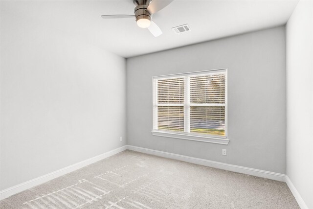 116 Augusta Dr, Huntsville, TX 77340 - empty room with light colored carpet, baseboards, and a ceiling fan