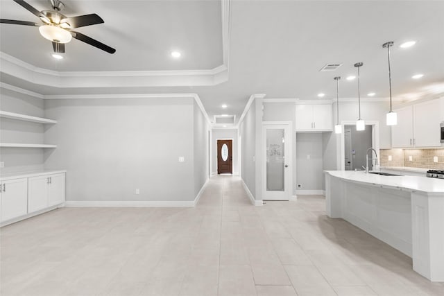 116 Augusta Dr, Huntsville, TX 77340 - kitchen featuring a sink, decorative backsplash, recessed lighting, ceiling fan, and ornamental molding