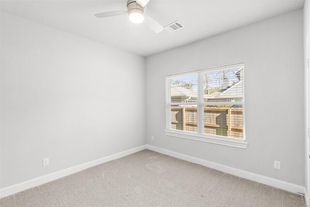 116 Augusta Dr, Huntsville, TX 77340 - unfurnished room with light carpet, baseboards, and a ceiling fan