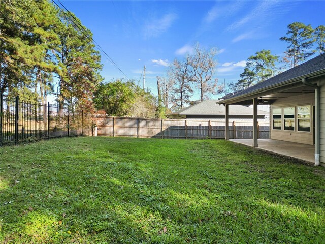 116 Augusta Dr, Huntsville, TX 77340 - view of yard featuring a patio and ceiling fan