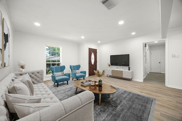 2113 Timber Ln, Conroe, TX 77301 - living area with recessed lighting, light wood-type flooring, ornamental molding, and baseboards