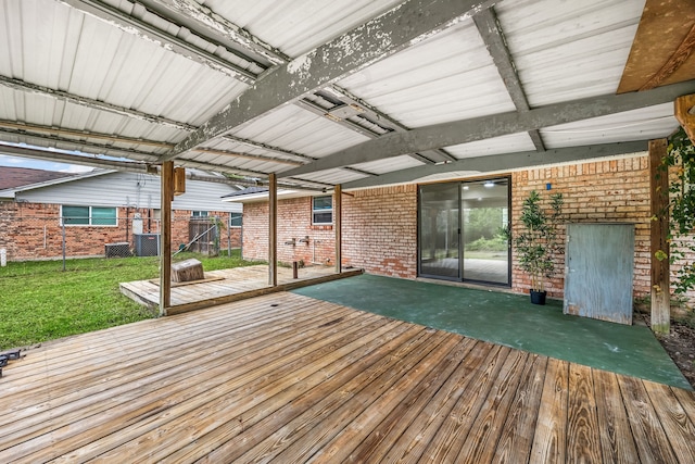 2113 Timber Ln, Conroe, TX 77301 - wooden deck with central AC unit