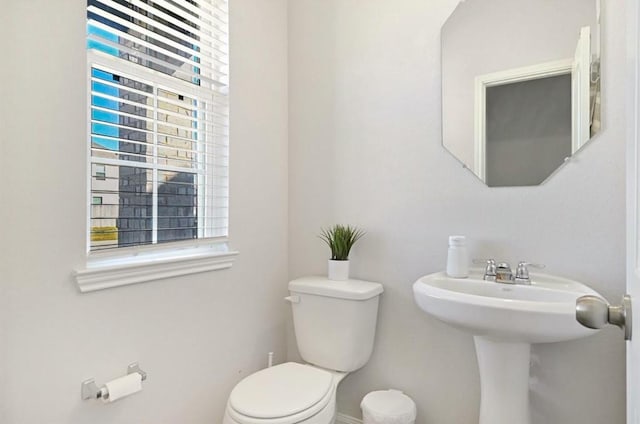 23523 Montague Dr, Spring, TX 77373 - half bathroom featuring toilet and baseboards