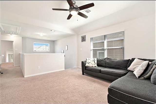 23523 Montague Dr, Spring, TX 77373 - living area with attic access, light carpet, ceiling fan, and baseboards