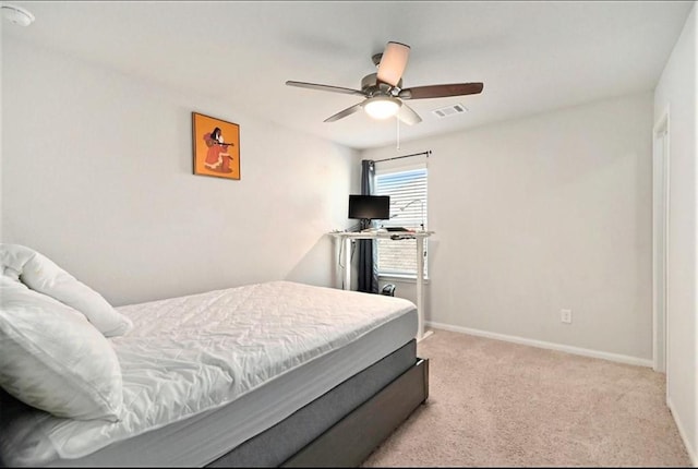 23523 Montague Dr, Spring, TX 77373 - bedroom with light carpet, baseboards, and a ceiling fan