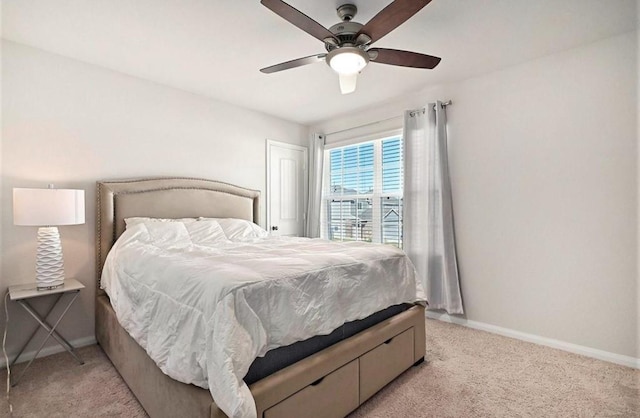 23523 Montague Dr, Spring, TX 77373 - bedroom with light carpet, baseboards, and ceiling fan